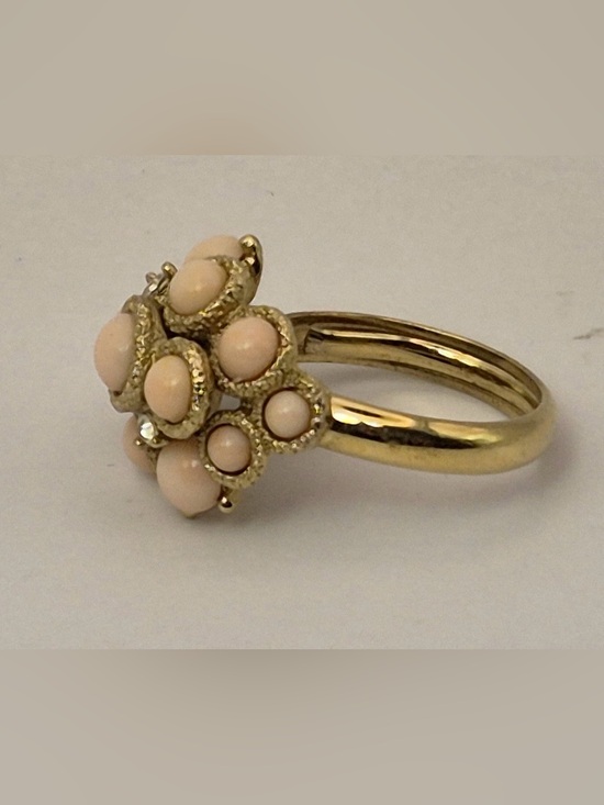 Vintage Avon Arabesque cluster ring featuring faux angel skin coral cabochons